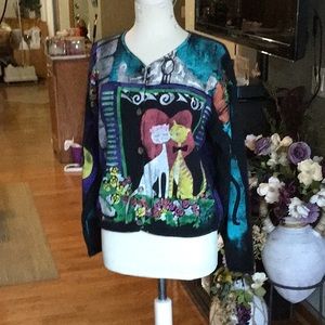 Sweater.  Short style cardigan with cats